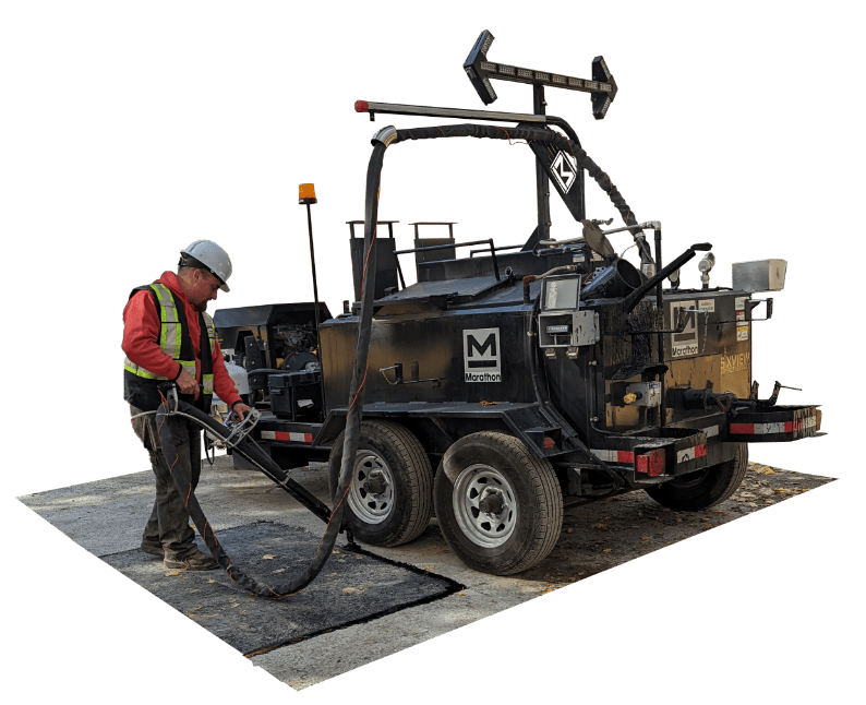 6ixview asphalt services's worker is using kera370bre to crack seal